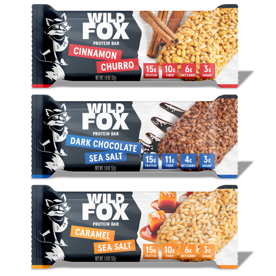 Three Wild Fox protein bars with different flavors on a white background