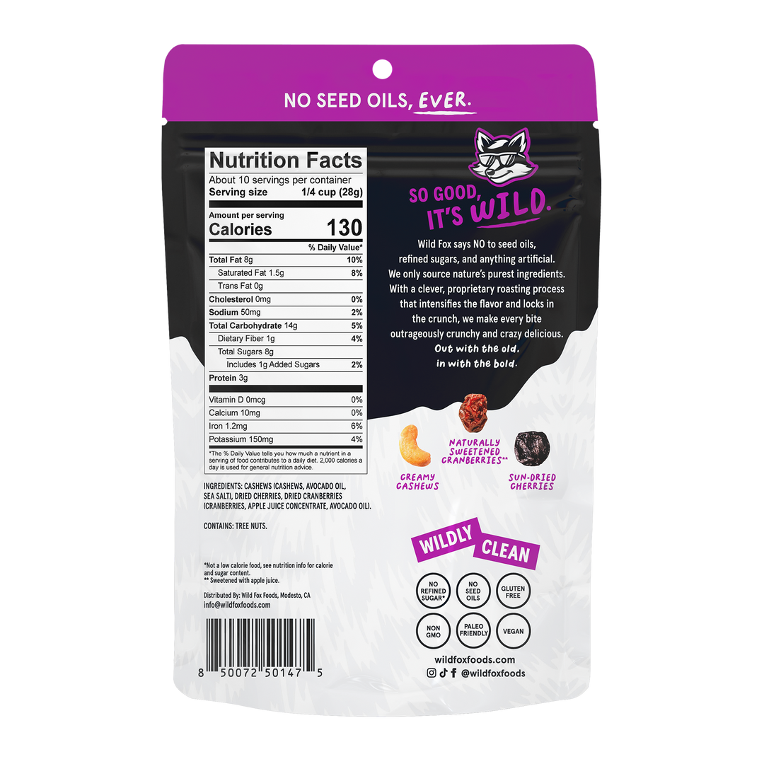 Back of Wild Fox Cashew Berry Cherry Trail Mix packaging with nutrition facts and branding details.