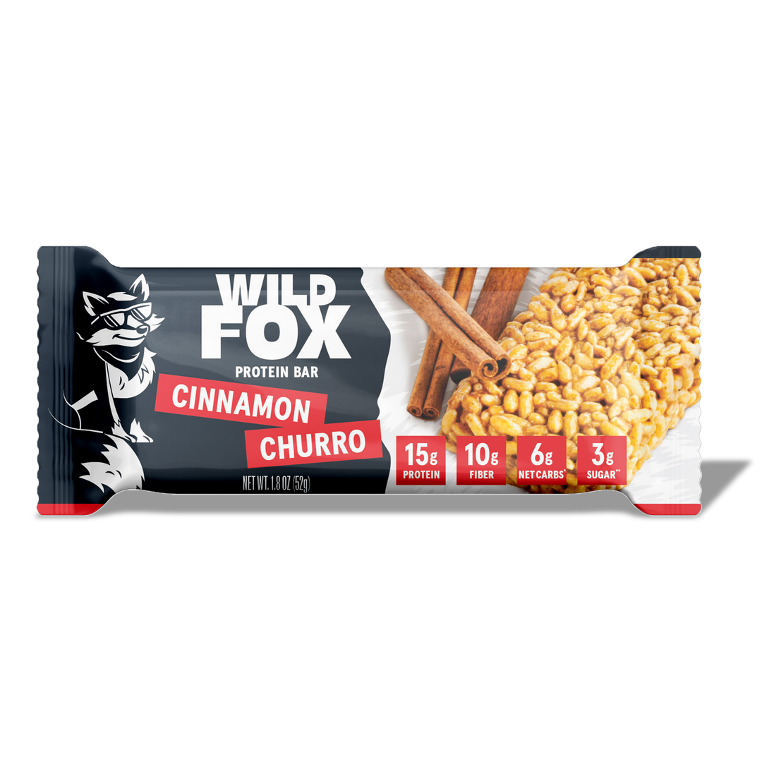 Wild Fox Cinnamon Churro protein bar packaging on a white background