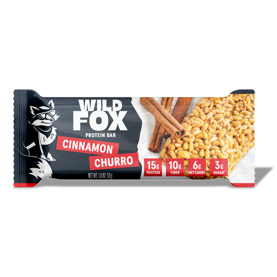 Wild Fox Cinnamon Churro protein bar packaging on a white background