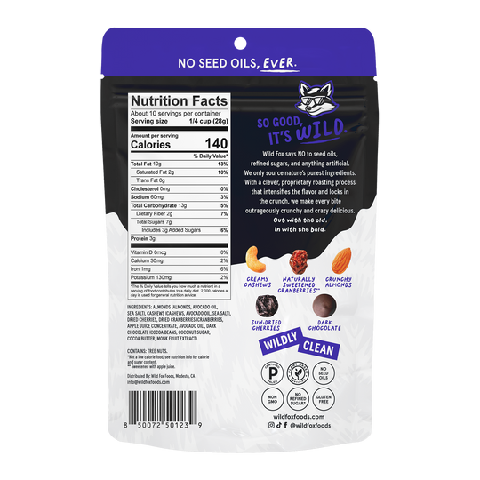Back view of a Wild Fox Foods Dark Chocolate Cherry Trail Mix packaging with nutritional information and branding details.